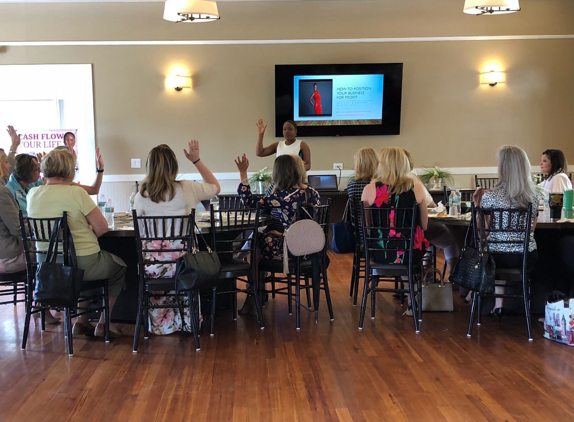 Jackie Jackson teaching a real estate investing workshop