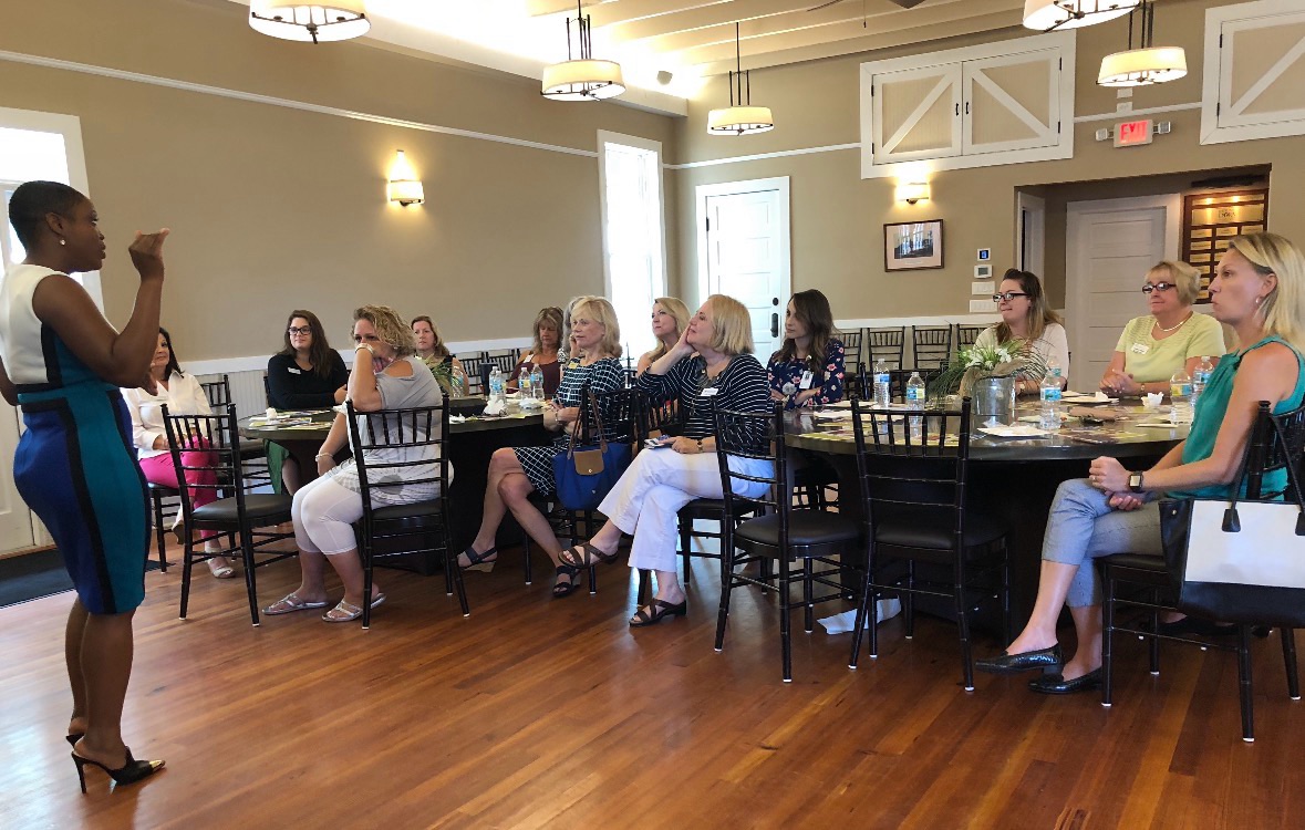 Jackie Jackson answering questions at a real estate investing workshop